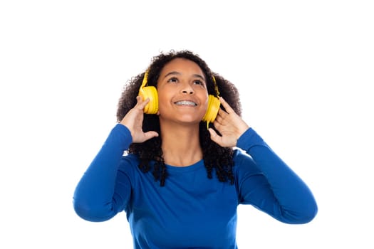 Teenager girl wearing blue sweater isolated on a white background