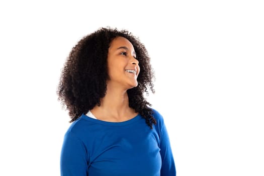 Teenager girl with afro hair wearing blue sweater isolated on a white background