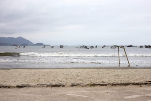 fishing boats ocean waves beach Brazil