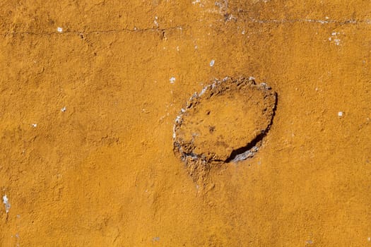 Old brown wall with cement brick surface