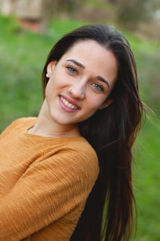 Outdoor portrait of beautiful happy teenager girl