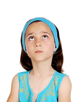 Beautiful pensive child with blue eyes isolated on a white background