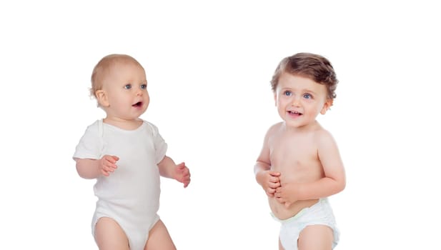 Two happy babies isolated on a white background