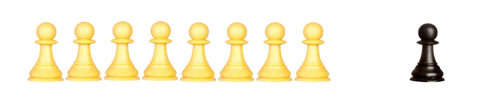 Many pawns yellow and other one black isolated on a white background