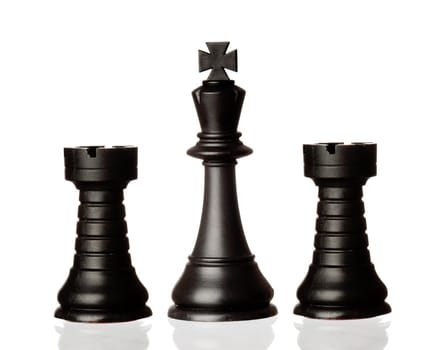 Black chess pieces isolated on a white background