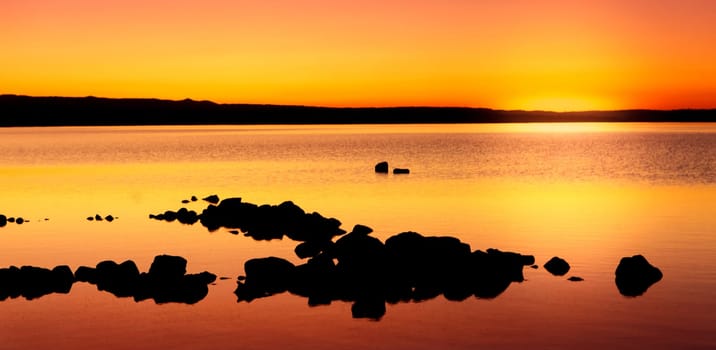Amazing sunset with golden and black colors
