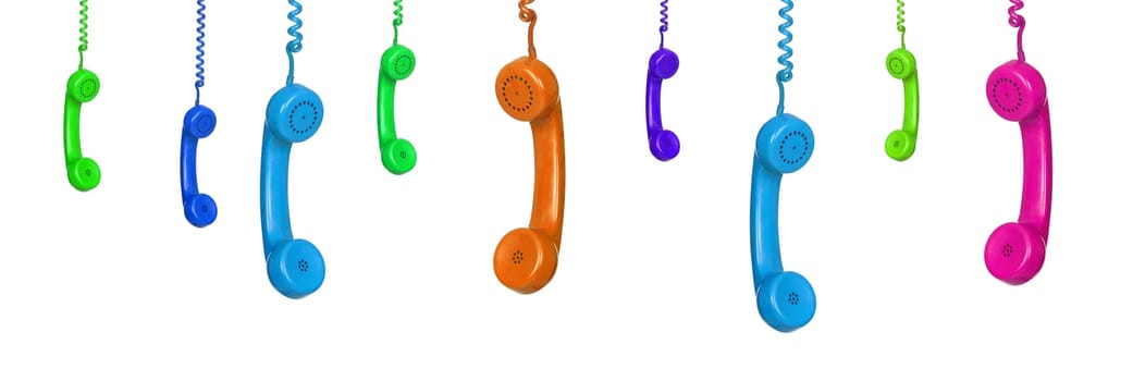 Row of old handsets hanging on white background