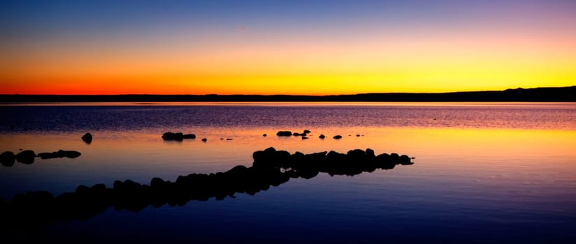 Beautiful landscape in a lake during the sunset with amazing colors