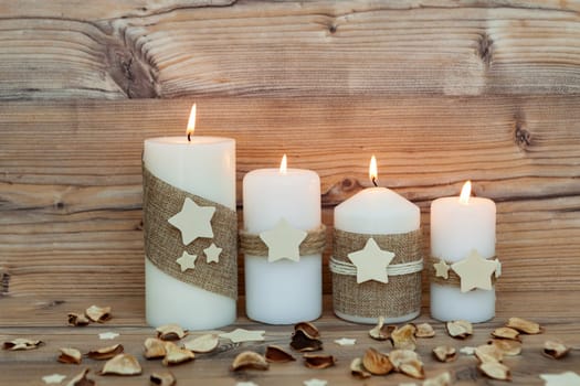 Beautiful Candles in home. Warm christmas decoration