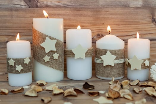 Beautiful Candles in home. Warm christmas decoration