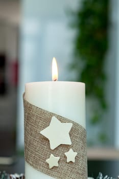 Beautiful Candles in home. Warm christmas decoration