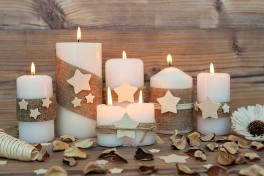 Beautiful Candles in home. Warm christmas decoration