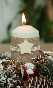 Beautiful Candles in home. Warm christmas decoration