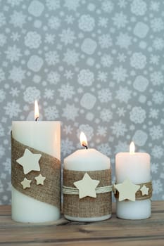 Beautiful Candles in home. Warm christmas decoration