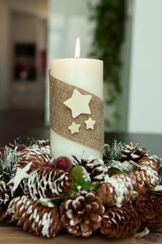 Beautiful Candles in home. Warm christmas decoration