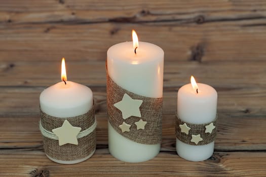 Beautiful Candles in home. Warm christmas decoration