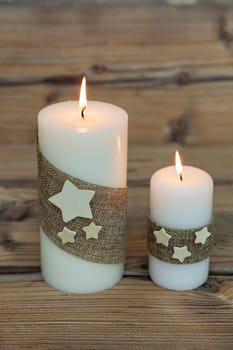 Beautiful Candles in home. Warm christmas decoration