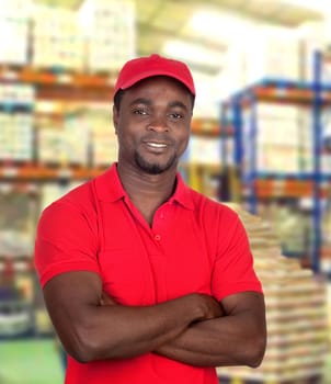Handsome african man working at logistics warehouse