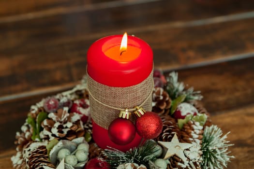 Candle for Christmas in red. Beautiful Holidays decoration