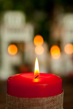 Candle for Christmas in red. Beautiful Holidays decoration