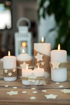 Beautiful Candles in home. Warm christmas decoration