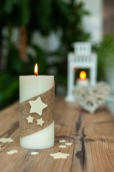 Beautiful Candles in home. Warm christmas decoration
