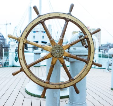 The Ship's Helm, Ship rudder, The Steering Wheel is Still Ready to Work, Vintage Wooden And Brass Ship's Steering Wheel Rudder