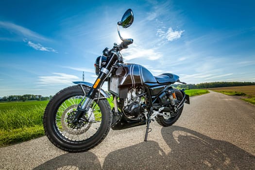 motorcycle in a sunny motorbike on the road riding. copyspace for your individual text. High quality photo