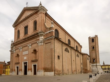 view of Baroque san Cassiano cathedral church, shot in bright light at Comacchio, Ferrara, Italy.