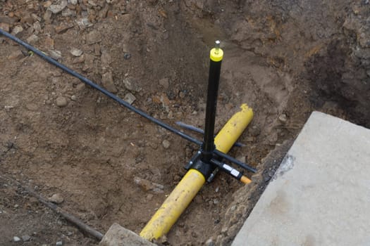 Supply lines in the ditch for the energy supply of a multiple dwelling