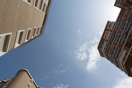 View of the modern multi-storey apartment buildings and sky view. Low angle view of building in downtown Malaga