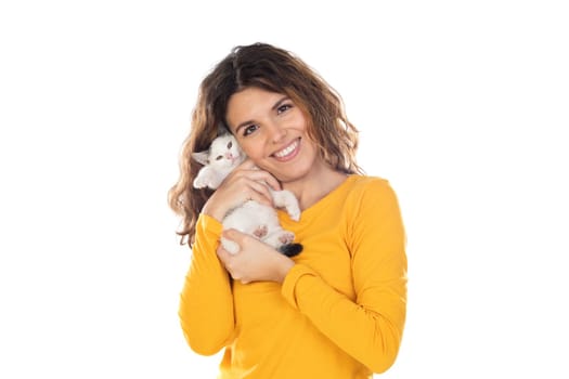 Cute young woman holding her cat isolated on a white background