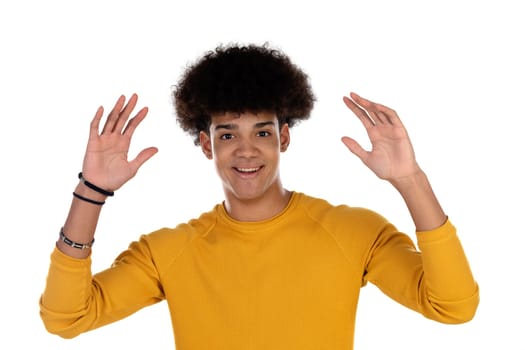 Surprised teenager boy with yellow t-shirt isolated on a white background