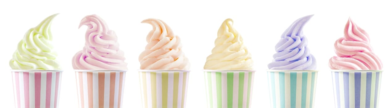 Row of six assorted ice cream flavours in differently styled twirls in colorful striped tubs isolated on white in a panorama banner or header for advertising