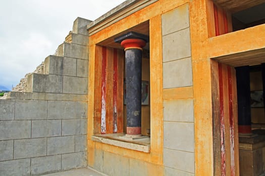 Orange window in The Palace of Knossos on Crete in Greece near Heraklion is called Europe’s oldest city and the ceremonial and political center of the Minoan civilization.