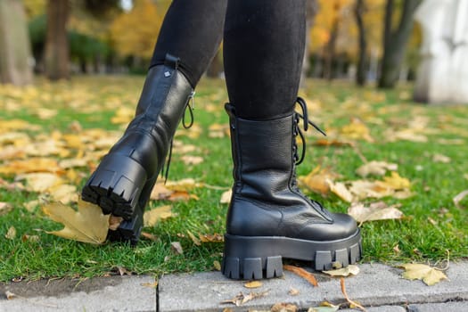 Elegant women's shoes on the foot on the street. Comfort and fashion. High quality photo