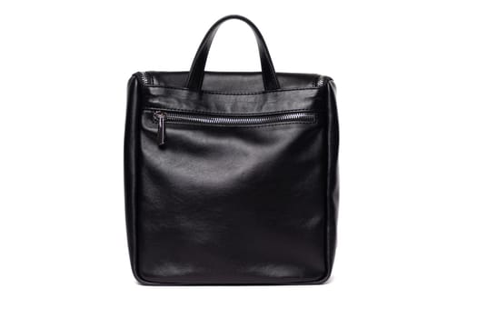 This black leather backpack features a minimalist design with a top handle and zippered compartment, ideal for carrying essentials during daily commutes or travel adventures.