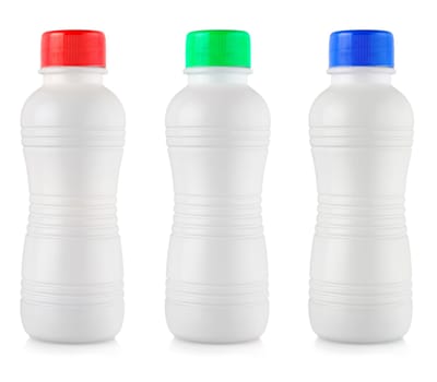 The Opaque white plastic bottles with colored lidon white background