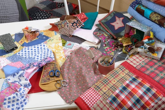 workshop of a seamstress with fabric and patchwork