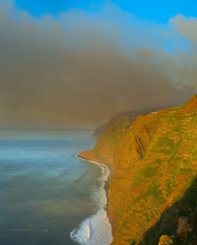 Smoke from burning forest over the ocean. Madeira isand, Portugal