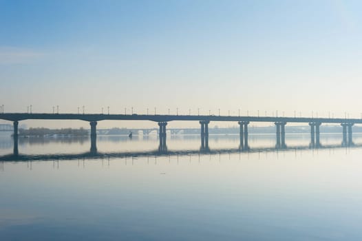 Paton bridge in a spring morning mist. Kiev, Ukraine