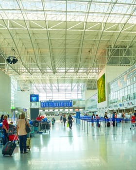 FRANKFURT, GERMANY - AUGUST 29, 2018: People at Frankfurt am Main airport hall. Frankfurt Airport is the busiest airport by passenger traffic in Germany as well as the 4th busiest in Europe