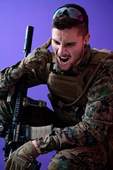 soldier preparing tactical and communication gear for action battle purple background