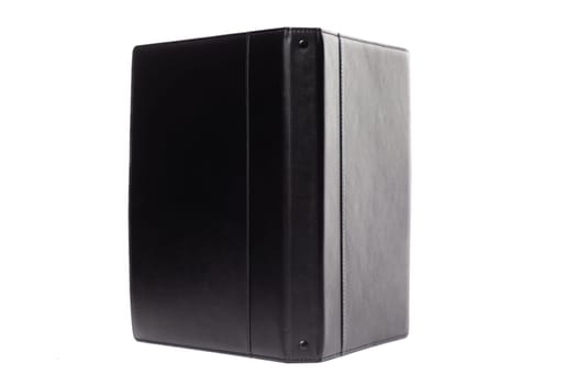 A sleek black folder made of high-quality leather stands upright, highlighting its elegant design.