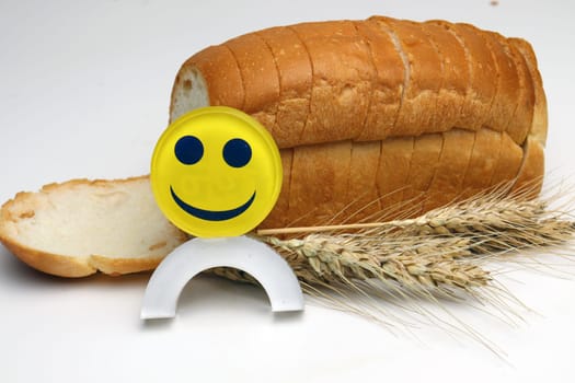 tasty and healthy bread with ripe wheat and smile symbol