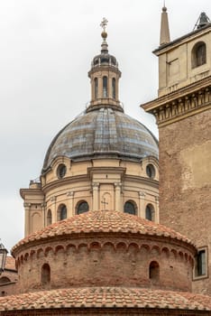 foreshortening of the domes of san Lorenzo and sant Andrea churches, shot in bright cloudy light  at Mantua, Lombardy, Italy.