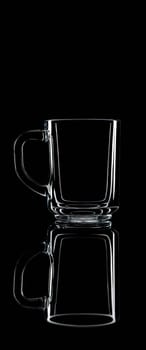 Just a glass on a black background with a reflection. Isolated.