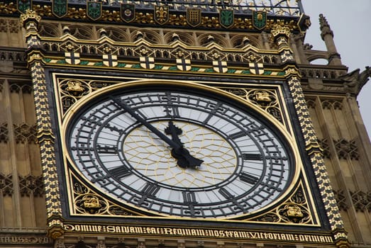 In 1895 the bells of Big Ben in London rang for the first time. It is now called the Elizabeth Tower. The clock is now showing 5 to 12.
