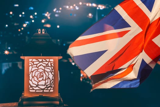 Burning candle and UK flag. The concept of mourning and sorrow in the country, UK national mourning