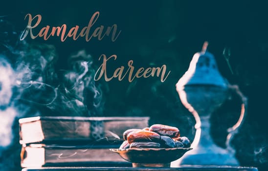 Festive greeting card for Muslim holy month Ramadan Kareem with dates, Quaran and censer